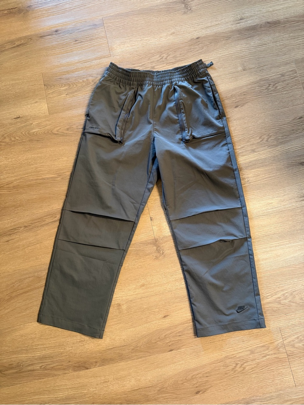 Woman’s Nike Sportswear Dri-Fit Tech Pack Woven Pants